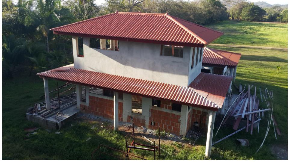 Unfinished house on beach lot in Santa Catalina area