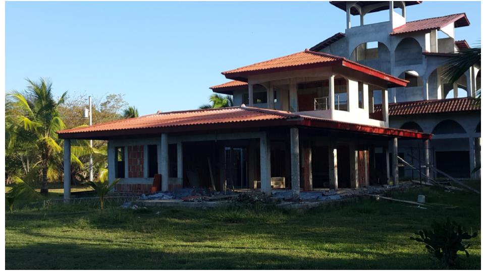 Unfinished house on beach lot in Santa Catalina area